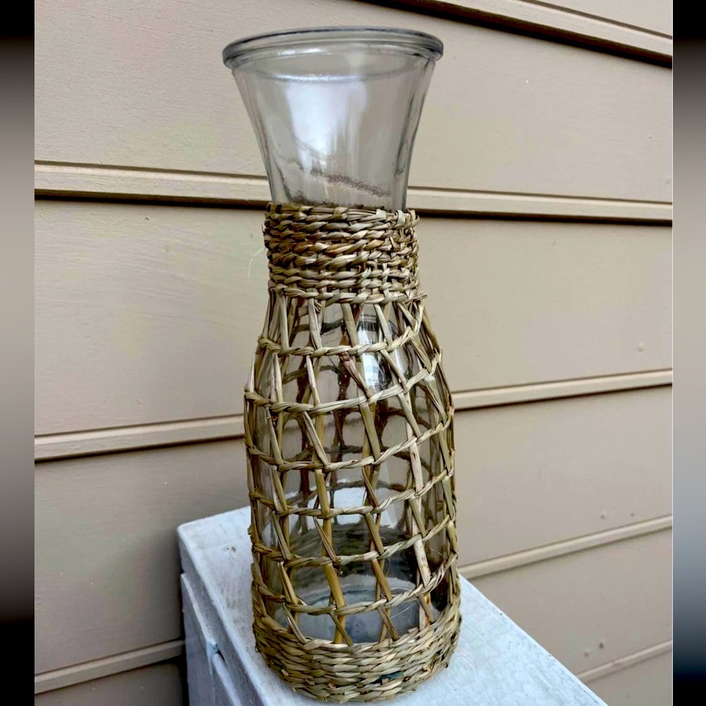 40 clear vases wrapped in twine. Used once in wedding.
